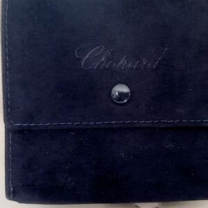 Blue velvety Chopard travel pouch